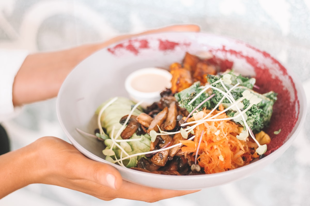 Mediterranean grain bowl with roasted vegetables and tahini dressing